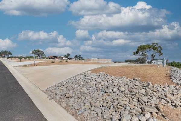 Pad with landscaped rock border